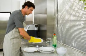Man washing dishes