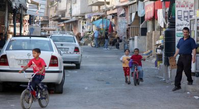 Palestinian children play in the streets of Balata refugee camp near the West Bank city of Nablus