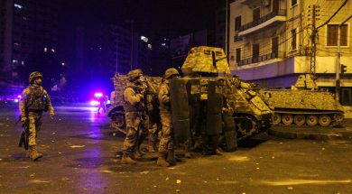 Army soldiers are deployed during clashes with demonstrators at a protest in Tripoli