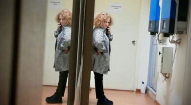 ghada-aoun-standing-talking-on-the-phone