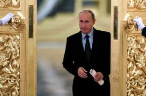 Russian President Vladimir Putin enters a hall to meet with members of the Presidential Council for Civil Society and Human Rights at the Kremlin in Moscow