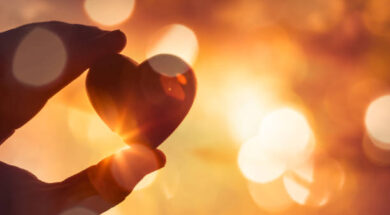 Hand holding heart.